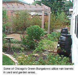 Photo of a house with rain barrels.