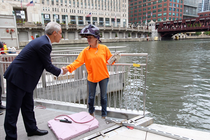 Mayor Emanuel Interacting With Riverwalk Worker